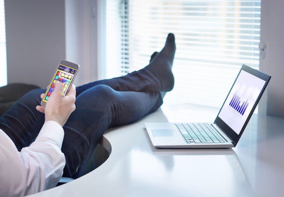 Sitting-back-with-feet-on-a-desk