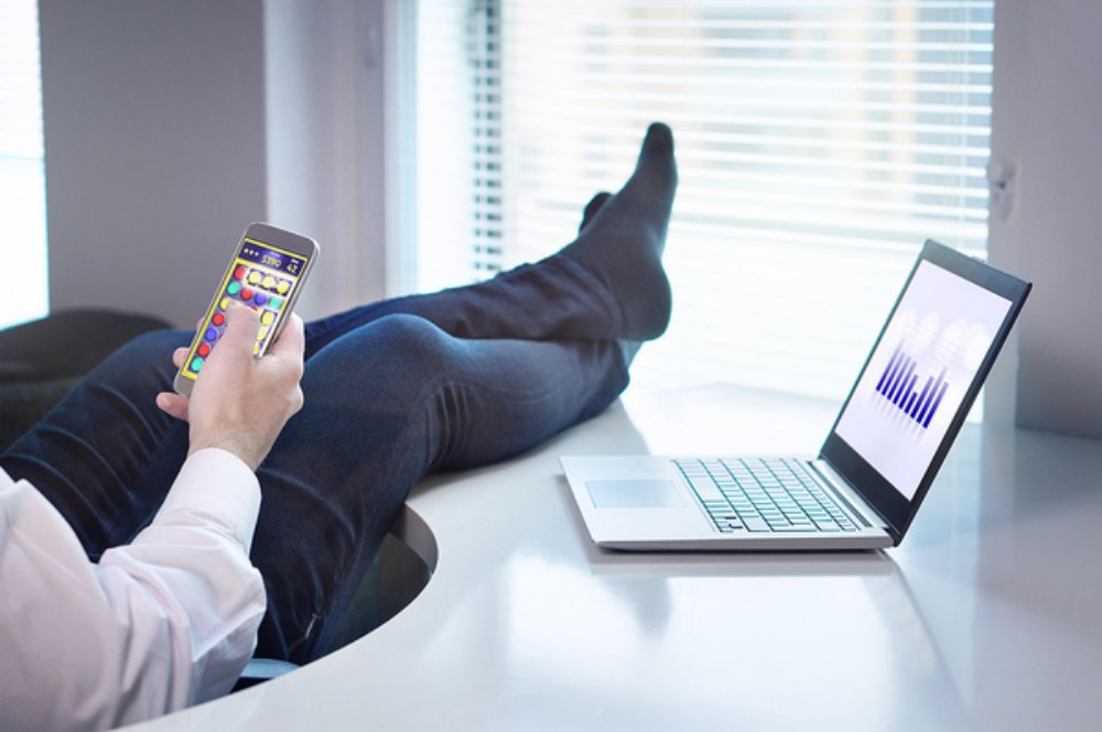 Sitting-back-with-feet-on-a-desk