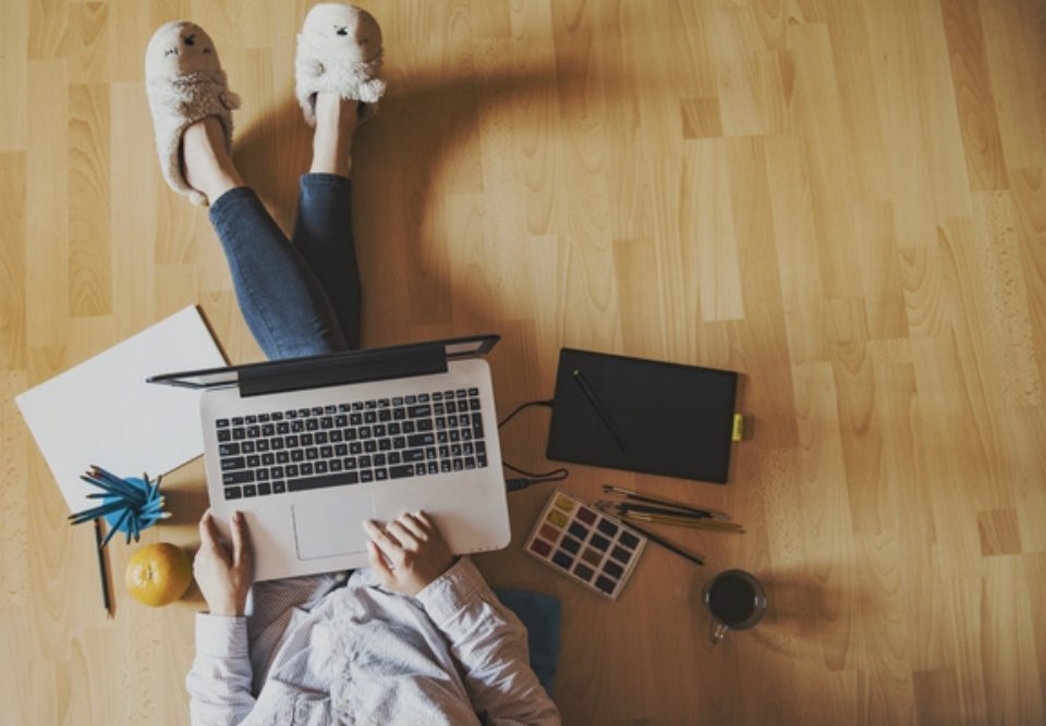 Sitting on the floor with a laptop